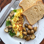 Spinach and Mushroom Egg White Omelette with Whole Wheat Toast